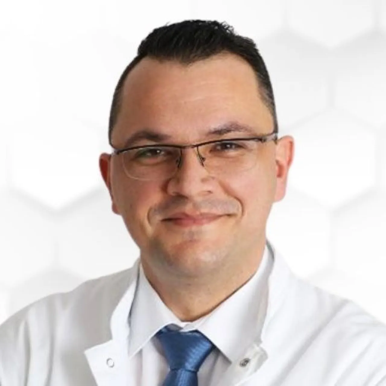 Dr. Tánczos Tamás